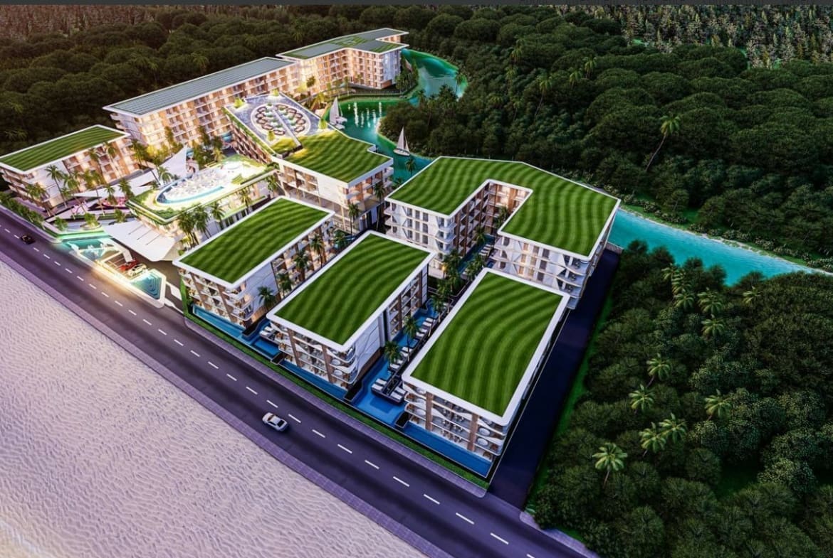 A building with a pool and trees